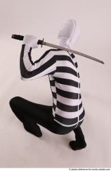 JIRKA KNEELING POSE WITH KATANA